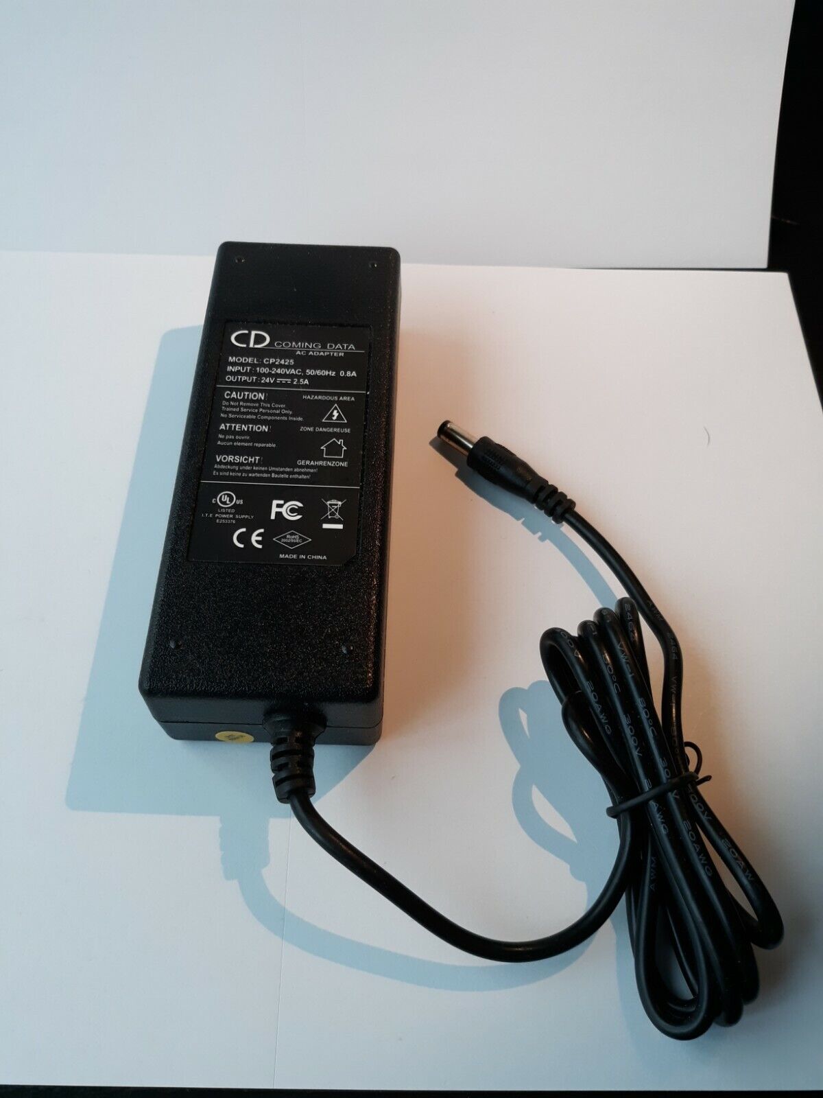 AC Adapter CD Coming Data, model:CP2425 24VDC, 2.5A Brand: Coming Data Type: AC/DC Adapter Color: Black Compatible