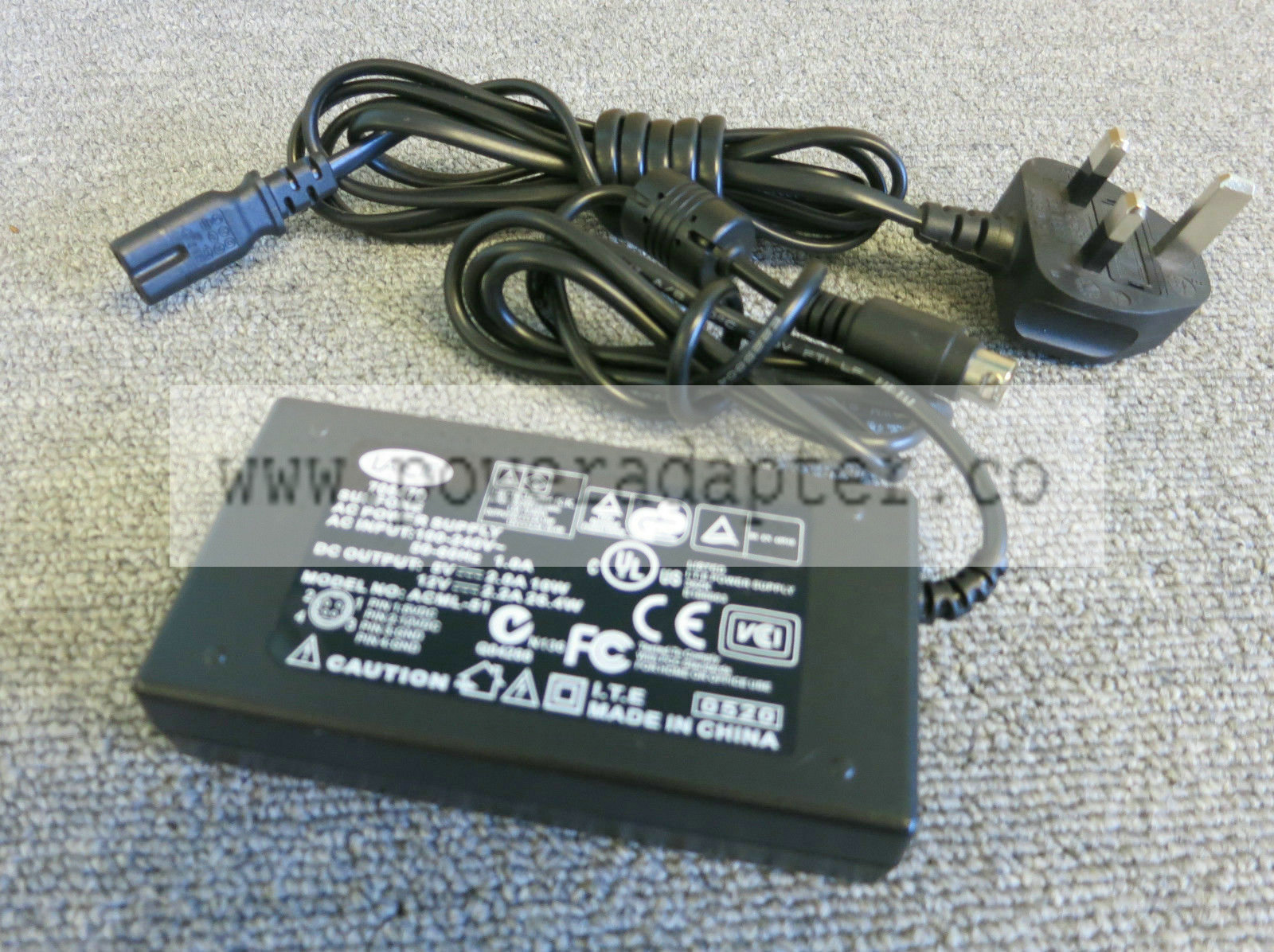 Lacie 706479, ACML-51 AC Power Adapter 4 Pin DIM 5V 2.0A 10W / 12V 2.2A 26.4W Supplied: With mains power cable Brand