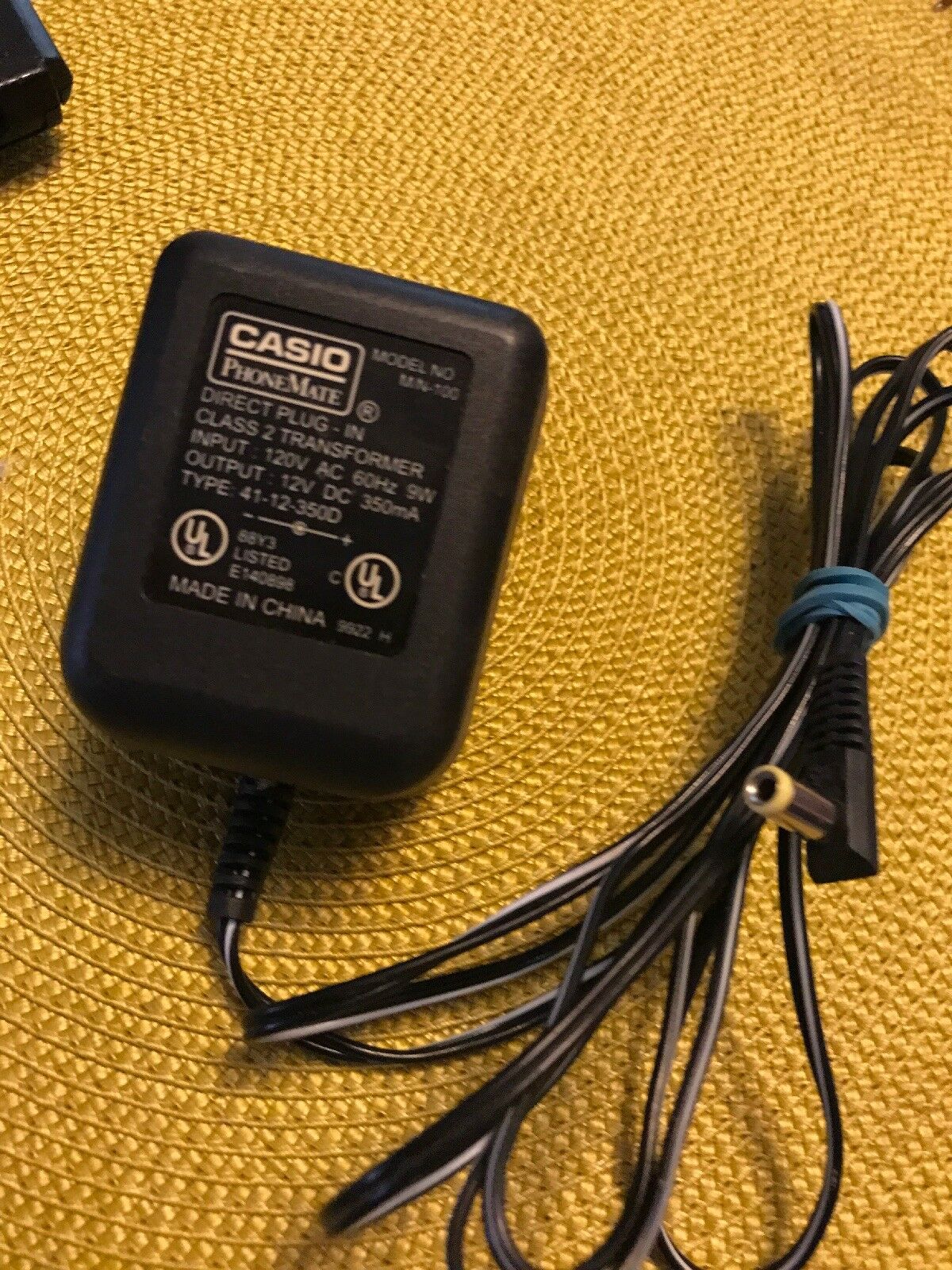 Casio PhoneMate AC Power Supply Adapter M/N-100 12V DC Tested Model: M/N-90 Output Voltage: 12V Type: Power Supply A