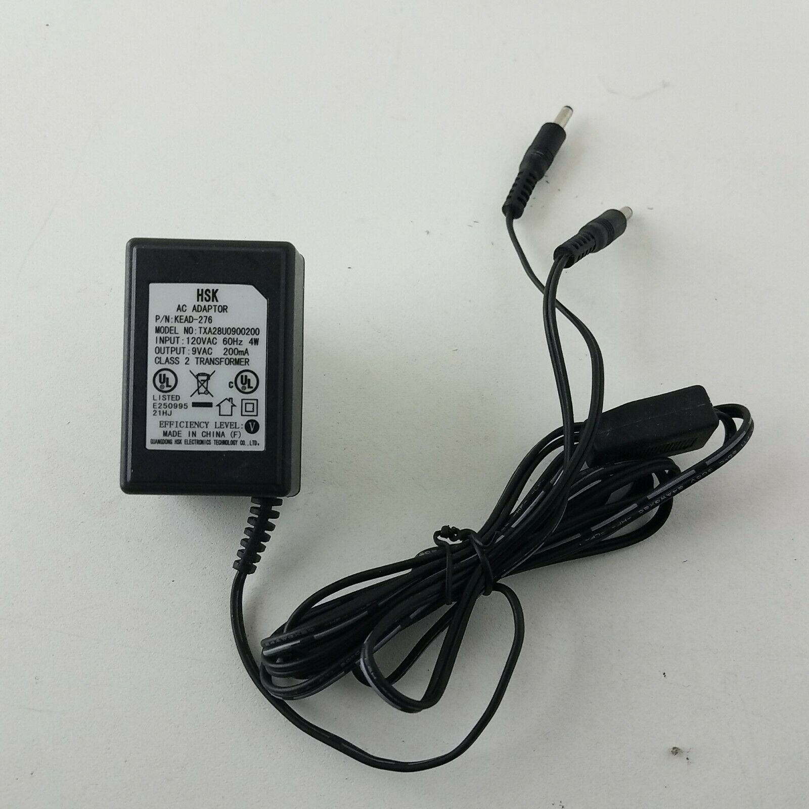 HSK AC Adapter KEAD-276 TXA28U0900200 9 V AC Country/Region of Manufacture: China Type: AC/AC Adapter Color: Black