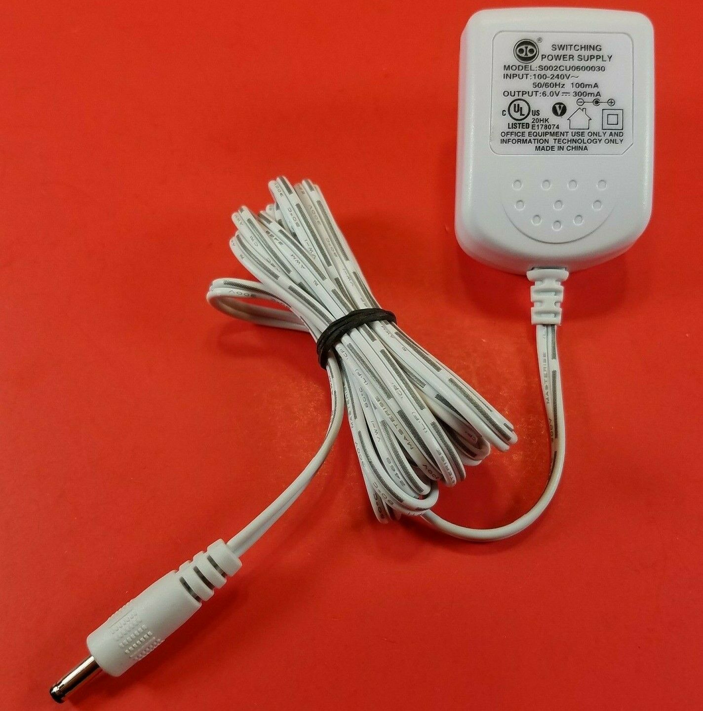 Switching Power Supply S002CU0500030 AC/DC Adapter 6V - 300mA Charger Adaptor Type: Switching Power Supply Features: