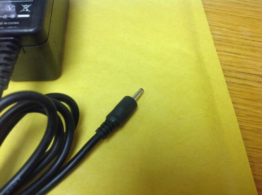 Genuine SHENZHEN Co. Ltd. AC Power Adapter Model No YHXH015-050200. 5V. 2A This power supply is exactly as shown in the
