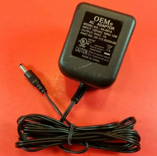 OEM AC Adapter Model AA-091A Power Supply Adaptor 9V - 1A Part No 30-112-000002B Type: AC Adapter Output Voltage: 9 V