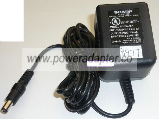 SHARP EA-65A AC ADAPTER 6VDC 300mA USED +(-) 2x5.5x9.6mm ROUND B